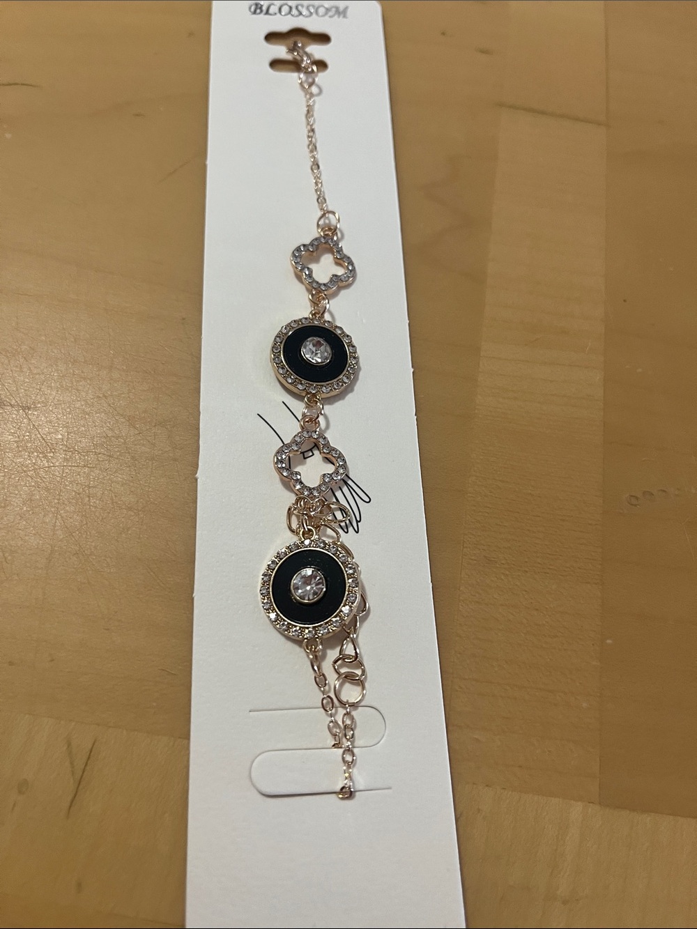 Blossom Gold-Tone Bracelet with Black Enamel and Crystal Accents